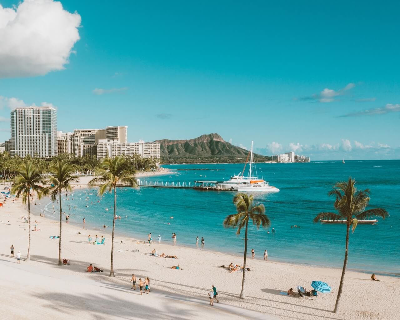 Beachgoers on a Hawai’i vacation from San Jose