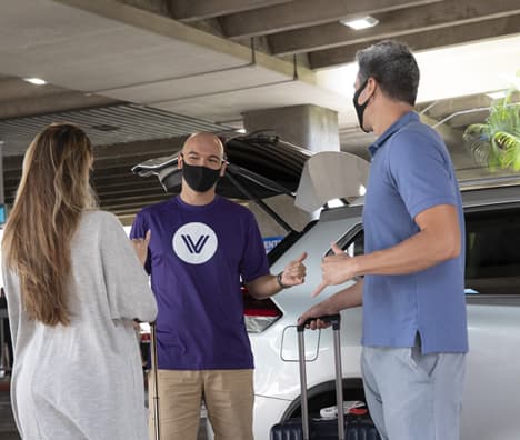 Two Members wave goodbye to their GoVibe driver