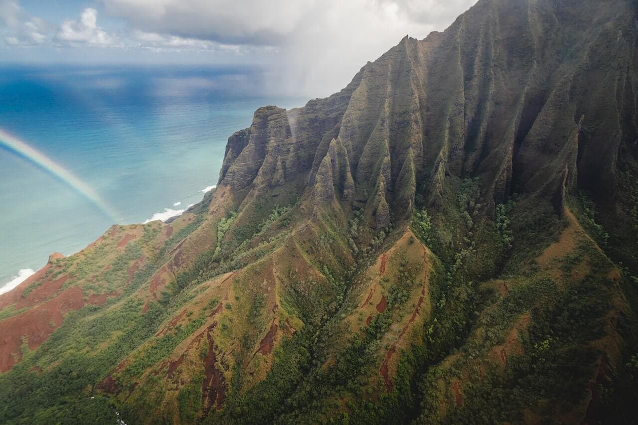 A rainbow near a mountain in Hawaii