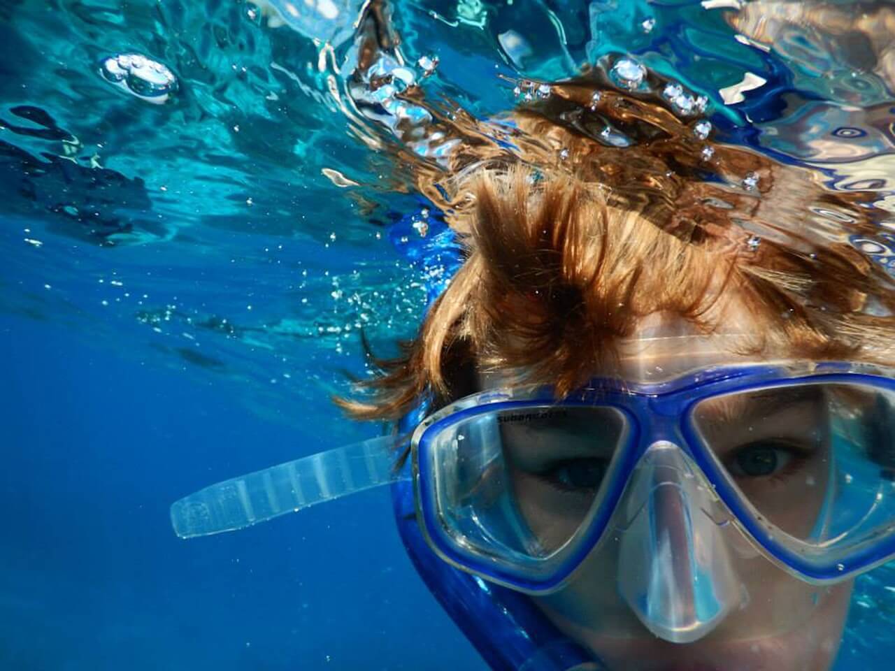 A close image of a person snorkeling