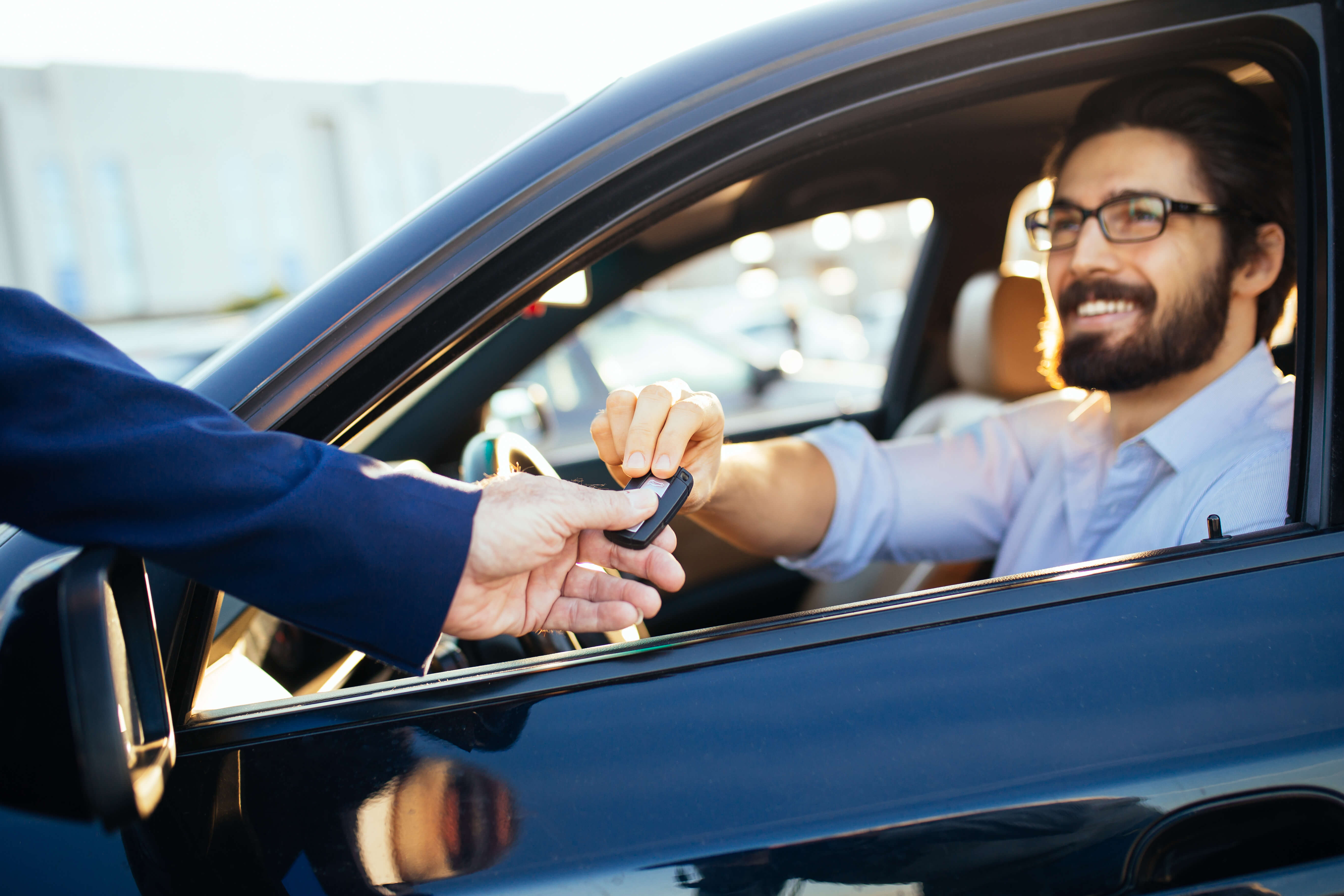 A GoVibe Member receives his car keys from a valet